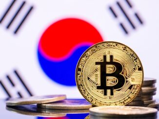 An image showing a representation of a bitcoin token against the backdrop of a South Korean flag.